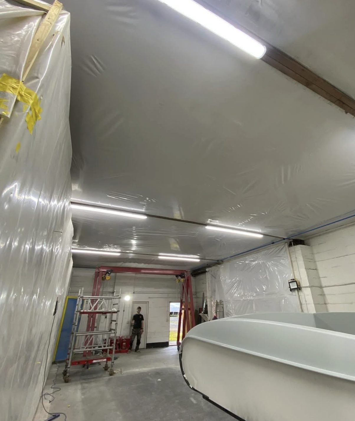 LED batten lighting fitted across a commercial workshop ceiling